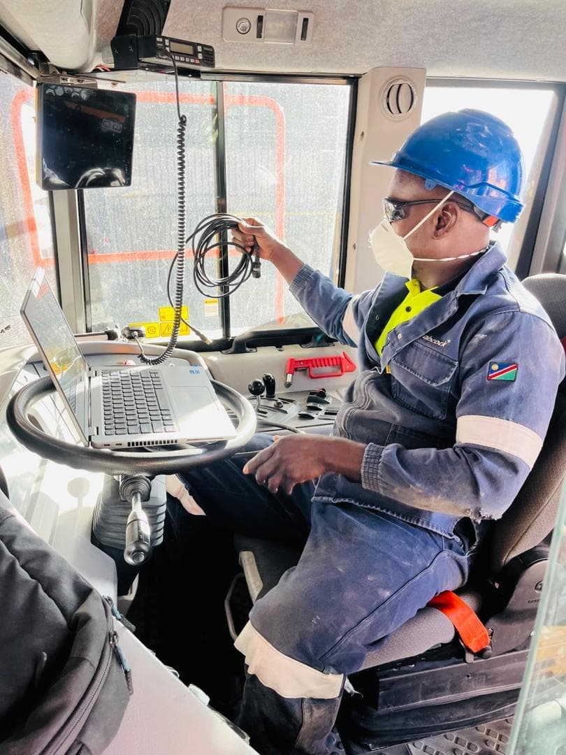 Vertical project photo showing equipment preparation and support activity